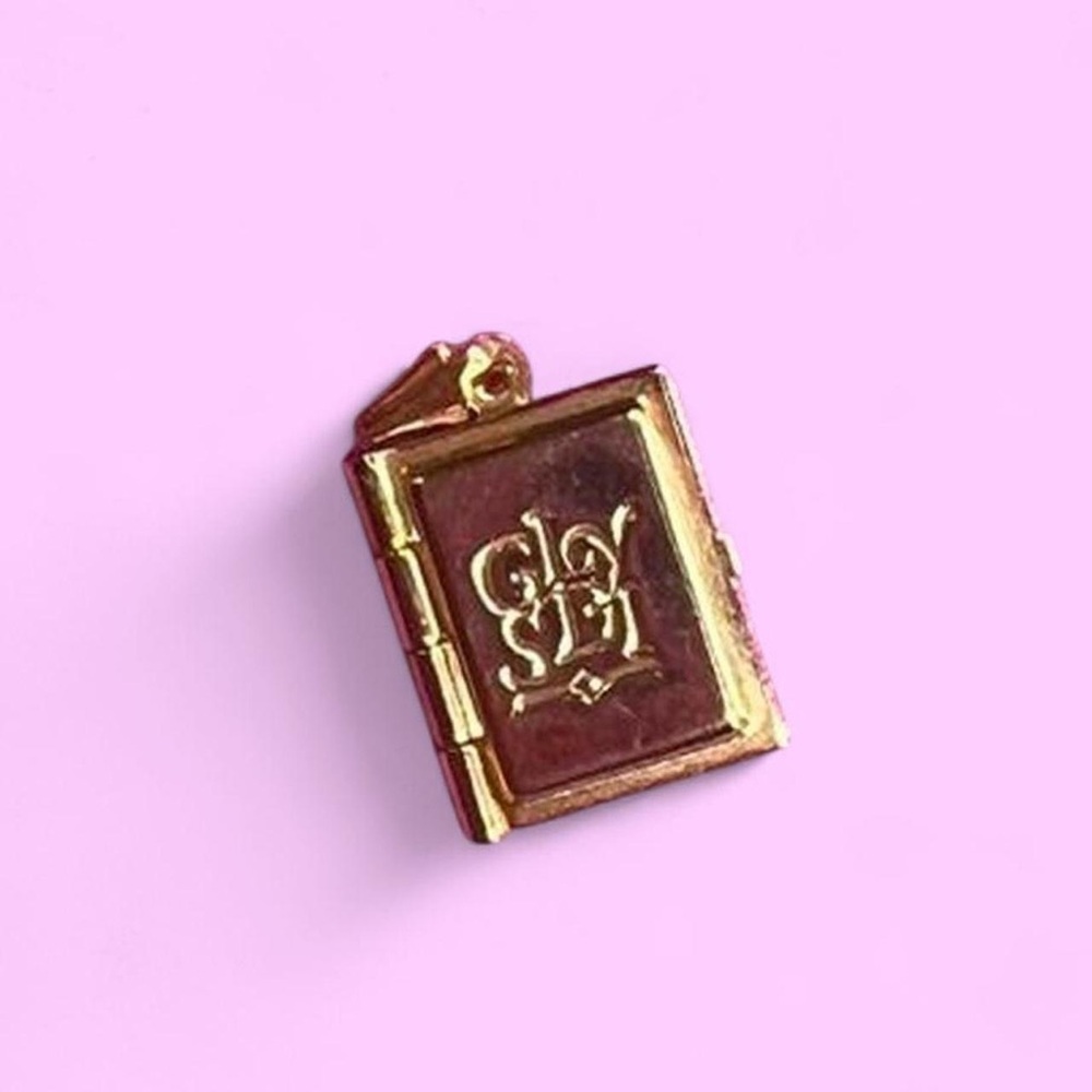 Vintage very small gold tone book locket with initials